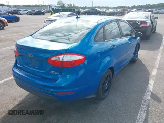 2015 Ford Fiesta SE z VIN 3FADP4BJ6FM125929, wystawiony jako IAAI lot #42181609 z przebiegiem 136 388 mil mil oraz . Historia ofert i sprzedaży dostępna na DreamBid. Obrazek 4.