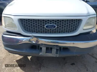 1999 Ford F-150 with VIN 1FTZX1720XKB31945, listed as a IAAI auction lot 42123984 with 187,766 mi miles and . Bid and sale history available at DreamBid. Image 18.