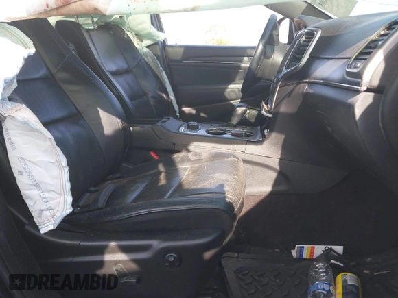 2018 Jeep Grand Cherokee Overland with VIN 1C4RJFCT1JC314558, listed as a IAAI auction lot 42206305 with 83,570 mi miles and . Bid and sale history available at DreamBid. Image 5.