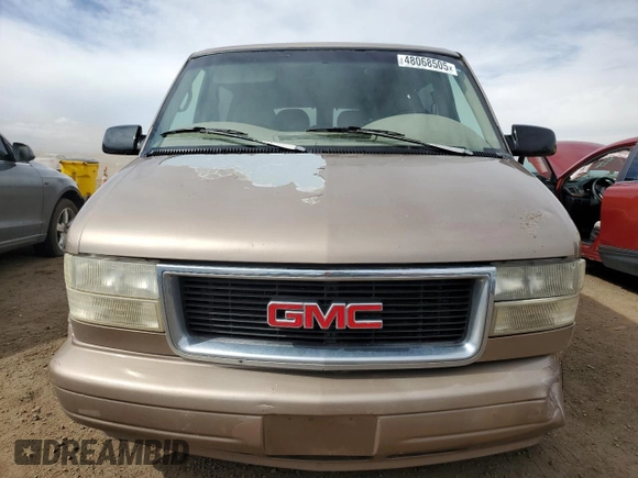 1999 GMC Safari z VIN 1GKDM19WXXB512466, wystawiony jako Copart lot #48068505 z przebiegiem 179 526 mil mil oraz Szkody całkowita. Historia ofert i sprzedaży dostępna na DreamBid. Obrazek 5.