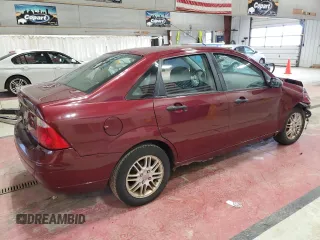 2006 Ford Focus S z VIN 1FAFP34N76W153239, wystawiony jako Copart lot #53085555 z przebiegiem 118 259 mil mil oraz Szkody całkowita. Historia ofert i sprzedaży dostępna na DreamBid. Obrazek 3.