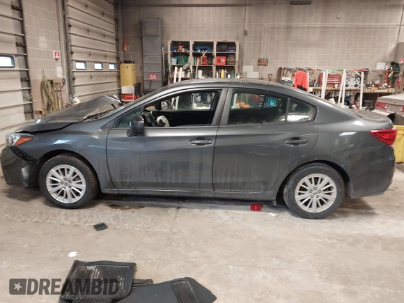 2018 Subaru Impreza Premium z VIN 4S3GKAD67J3619711, wystawiony jako IAAI lot #41475064 z przebiegiem 58 818 mil mil oraz . Historia ofert i sprzedaży dostępna na DreamBid. Obrazek 14.