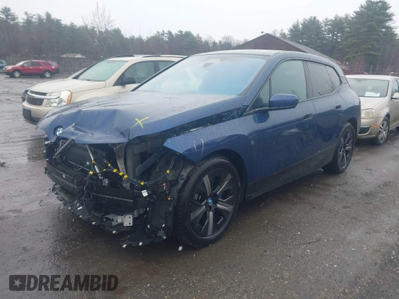 2023 BMW iX xDrive50 z VIN WB523CF08PCM23678, wystawiony jako IAAI lot #41930985 z przebiegiem 19 040 mil mil oraz . Historia ofert i sprzedaży dostępna na DreamBid. Obrazek 20.