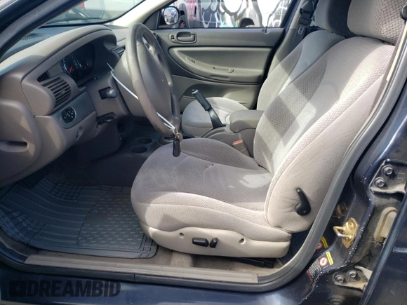 2004 Chrysler Sebring Touring z VIN 1C3AL56R64N291602, wystawiony jako Copart lot #71096534 z przebiegiem 98 772 mil mil oraz Szkody całkowita. Historia ofert i sprzedaży dostępna na DreamBid. Obrazek 7.