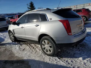 2016 Cadillac SRX Luxury Collection z VIN 3GYFNBE39GS520589, wystawiony jako Copart lot #85966584 z przebiegiem 168 803 mil mil oraz Tytuł czysty. Historia ofert i sprzedaży dostępna na DreamBid. Obrazek 2.
