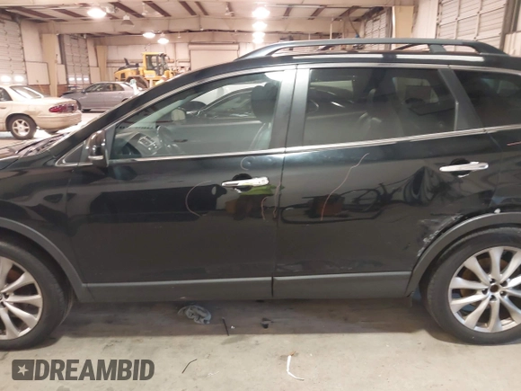 2015 Mazda CX-9 Grand Touring with VIN JM3TB3DV3F0460493, listed as a IAAI auction lot 41053565 with 213,124 mi miles. Bid and sale history available at carsss.com. Image 14.