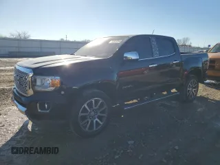 2020 GMC Canyon 4WD Denali with VIN 1GTG6EEN2L1131363, listed as a Copart auction lot 83033354 with 52,694 mi miles and Salvage Title. Bid and sale history available at carsss.com. Image 1.