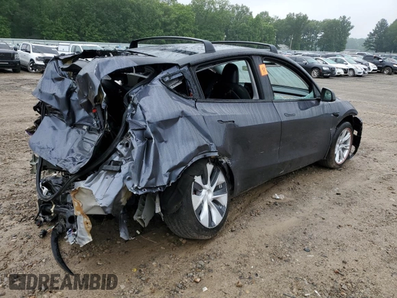 2023 Tesla Model Y Long Range z VIN 7SAYGDEE7PF870370, wystawiony jako Copart lot #55700135 z przebiegiem 32 410 mil mil oraz Szkoda całkowita • Salvage title. Historia ofert i sprzedaży dostępna na DreamBid. Obrazek 3.