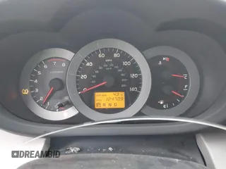 2006 Toyota RAV4 with VIN JTMBD33VX65015543, listed as a IAAI auction lot 41986857 with 124,709 mi miles. Bid and sale history available at carsss.com. Image 7.