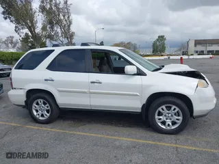 2004 Acura MDX Touring Pkg w/Navigation with VIN 2HNYD18834H520180, listed as a IAAI auction lot 41934124 with 201,817 mi miles. Bid and sale history available at carsss.com. Image 13.