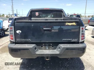 2014 Honda Ridgeline Sport with VIN 5FPYK1F73EB007015, listed as a Copart auction lot 55148465 with 131,148 mi miles and Salvage title. Bid and sale history available at DreamBid. Image 6.