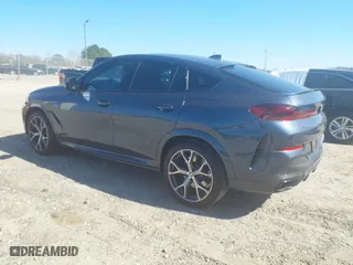 2021 BMW X6 M50i with VIN 5UXCY8C07M9E32426, listed as a IAAI auction lot 41715641 with 23,000 mi miles. Bid and sale history available at carsss.com. Image 3.