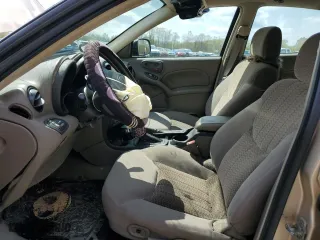 2004 Pontiac Grand Am SE1 with VIN 1G2NF52E54C209978, listed as a Copart auction lot 60198674 with 100,238 mi miles and Salvage Title. Bid and sale history available at carsss.com. Image 7.