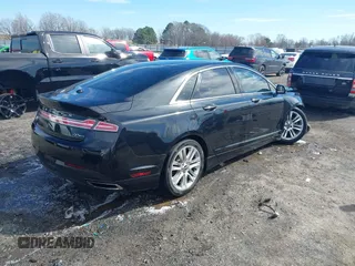 2014 Lincoln MKZ with VIN 3LN6L2G91ER814890, listed as a IAAI auction lot 41651789 with 143,445 mi miles and . Bid and sale history available at DreamBid. Image 4.