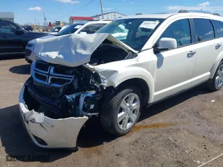 2014 Dodge Journey Limited with VIN 3C4PDCDG6ET105728, listed as a IAAI auction lot 41859746 with 184,335 mi miles. Bid and sale history available at carsss.com. Image 6.