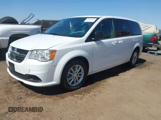 2017 Dodge Grand Caravan SE with VIN 2C4RDGBG1HR854401, listed as a IAAI auction lot 42015678 with 116,031 mi miles and . Bid and sale history available at DreamBid. Image 2.