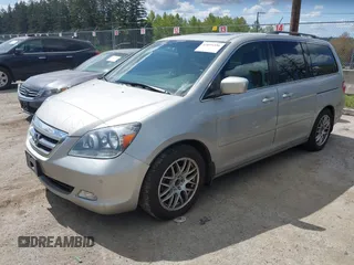 2006 Honda Odyssey TOURING with VIN 5FNRL38806B000049, listed as a IAAI auction lot 42095336 with 218,584 mi miles. Bid and sale history available at carsss.com. Image 2.