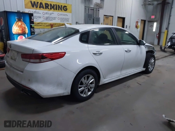 2018 Kia Optima S with VIN 5XXGT4L35JG209737, listed as a IAAI auction lot 41806505 with 98,869 mi miles and . Bid and sale history available at DreamBid. Image 4.