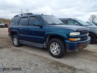 2005 Chevrolet Tahoe Z71 with VIN 1GNEK13Z95R255918, listed as a IAAI auction lot 42033067 with 236,936 mi miles. Bid and sale history available at carsss.com. Image 1.