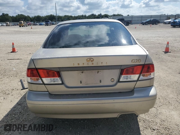 2002 Infiniti G20 Luxury z VIN JNKCP11A12T501940, wystawiony jako Copart lot #74041014 z przebiegiem Nie podano mil oraz Szkoda całkowita • Salvage title. Historia ofert i sprzedaży dostępna na DreamBid. Obrazek 6.