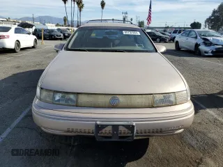 1993 Mercury Sable z VIN 1MELM5849PA655685, wystawiony jako Copart lot #85732984 z przebiegiem 98 081 mil mil oraz Tytuł czysty. Historia ofert i sprzedaży dostępna na DreamBid. Obrazek 5.