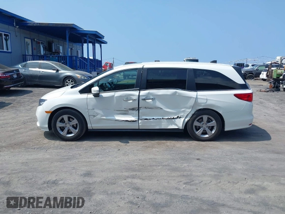 2022 Honda Odyssey EX-L with VIN 5FNRL6H79NB054120, listed as a IAAI auction lot 41694040 with 55,036 mi miles and . Bid and sale history available at DreamBid. Image 6.