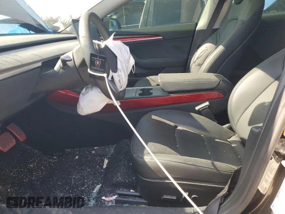 2023 Tesla Model 3 z VIN 5YJ3E1EA7PF668511, wystawiony jako Copart lot #51055725 z przebiegiem 53 594 mil mil oraz Szkoda całkowita • Salvage title. Historia ofert i sprzedaży dostępna na DreamBid. Obrazek 7.