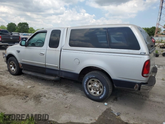 1999 Ford F-250 with VIN 1FTRX27LXXNC18863, listed as a Copart auction lot 63051395 with 118,695 mi miles and Clean title. Bid and sale history available at DreamBid. Image 2.