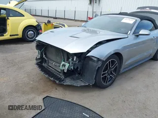 2020 Ford Mustang EcoBoost z VIN 1FATP8UH6L5131602, wystawiony jako IAAI lot #42228919 z przebiegiem 82 807 mil mil oraz . Historia ofert i sprzedaży dostępna na DreamBid. Obrazek 6.