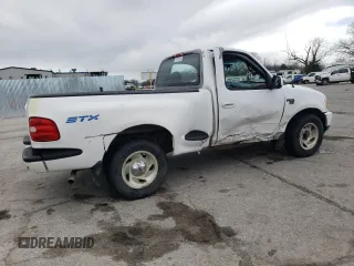 1998 Ford F-150 with VIN 1FTZF0768WKB35711, listed as a Copart auction lot 50441605 with 165,604 mi miles and Salvage title. Bid and sale history available at DreamBid. Image 3.