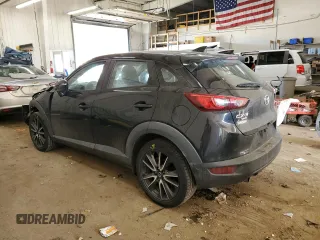 2018 Mazda CX-3 Touring with VIN JM1DKFC70J0316975, listed as a Copart auction lot 48657905 with 76,240 mi miles and Salvage Title. Bid and sale history available at carsss.com. Image 2.