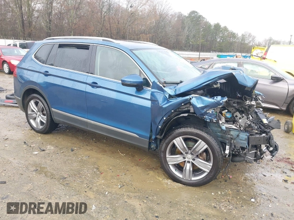2020 Volkswagen Tiguan SE z VIN 3VV3B7AX5LM176136, wystawiony jako IAAI lot #41564431 z przebiegiem 74 867 mil mil oraz . Historia ofert i sprzedaży dostępna na DreamBid. Obrazek 1.