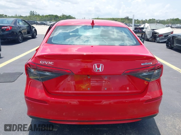 2023 Honda Civic Touring with VIN 2HGFE1F94PH323451, listed as a IAAI auction lot 42383422 with 6,120 mi miles and . Bid and sale history available at DreamBid. Image 16.
