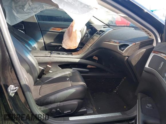 2014 Lincoln MKZ with VIN 3LN6L2G91ER814890, listed as a IAAI auction lot 41651789 with 143,445 mi miles and . Bid and sale history available at DreamBid. Image 5.