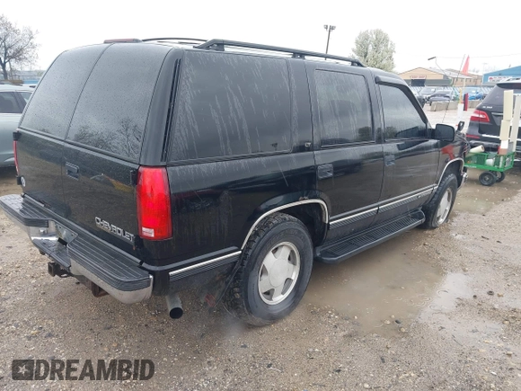 1999 Chevrolet Tahoe Z71 with VIN 1GNEK13R8XJ497892, listed as a IAAI auction lot 42120856 with 172,150 mi miles and . Bid and sale history available at DreamBid. Image 4.