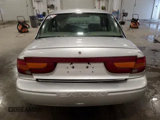 2002 Saturn SL z VIN 1G8ZK527X2Z267857, wystawiony jako Copart lot #46072975 z przebiegiem Nie podano mil oraz Szkoda całkowita • Salvage title. Historia ofert i sprzedaży dostępna na DreamBid. Obrazek 6.