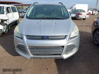 2014 Ford Escape SE with VIN 1FMCU9GX6EUB20308, listed as a IAAI auction lot 41818794 with 141,587 mi miles. Bid and sale history available at carsss.com. Image 6.
