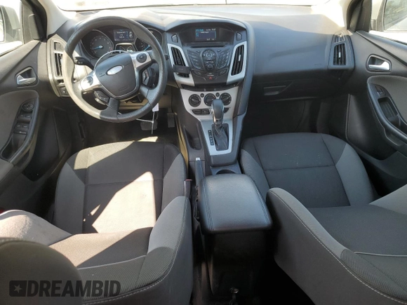 2012 Ford Focus SE z VIN 1FAHP3K20CL219046, wystawiony jako Copart lot #58771285 z przebiegiem 167 703 mil mil oraz Szkoda całkowita • Salvage title. Historia ofert i sprzedaży dostępna na DreamBid. Obrazek 8.