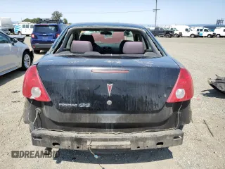 2006 Pontiac G6 1SV z VIN 1G2ZF55BX64225352, wystawiony jako Copart lot #57915805 z przebiegiem 194 400 mil mil oraz Szkoda całkowita • Salvage title. Historia ofert i sprzedaży dostępna na DreamBid. Obrazek 6.