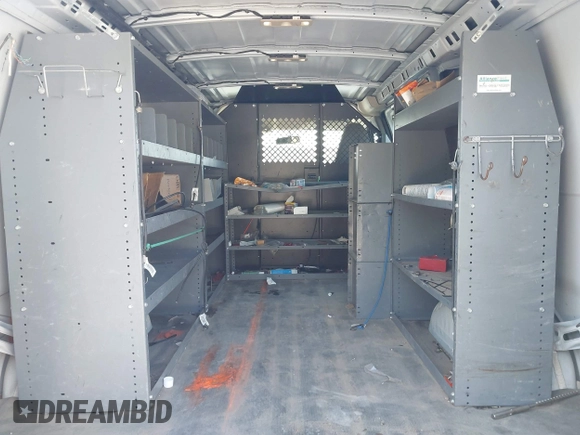 2019 Chevrolet Express Cargo Van with VIN 1GCWGAFPXK1164773, listed as a IAAI auction lot 41984554 with 87,916 mi miles. Bid and sale history available at carsss.com. Image 17.