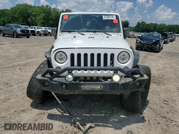 2015 Jeep Wrangler Unlimited Rubicon with VIN 1C4BJWFG6FL710993, listed as a Copart auction lot 62308195 with 103,938 mi miles and Salvage title. Bid and sale history available at DreamBid. Image 13.