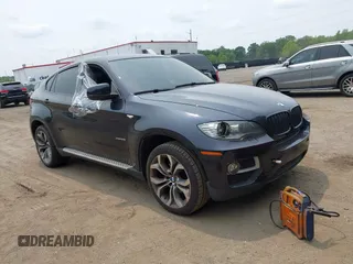 2014 BMW X6 xDrive35i z VIN 5UXFG2C59E0H10337, wystawiony jako IAAI lot #42448318 z przebiegiem Nie podano mil oraz . Historia ofert i sprzedaży dostępna na DreamBid. Obrazek 1.