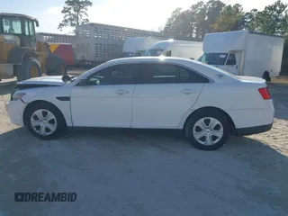 2014 Ford Police Interceptor z VIN 1FAHP2MK2EG125804, wystawiony jako IAAI lot #41297103 z przebiegiem 99 340 mil mil oraz . Historia ofert i sprzedaży dostępna na DreamBid. Obrazek 14.