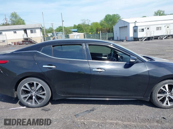2018 Nissan Maxima SV with VIN 1N4AA6APXJC369633, listed as a IAAI auction lot 42256821 with 67,819 mi miles and . Bid and sale history available at DreamBid. Image 13.