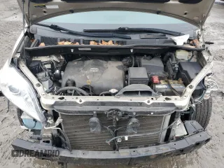 2017 Toyota Sienna LE with VIN 5TDJZ3DC8HS149992, listed as a Copart auction lot 51878725 with 90,299 mi miles and Salvage title. Bid and sale history available at DreamBid. Image 12.