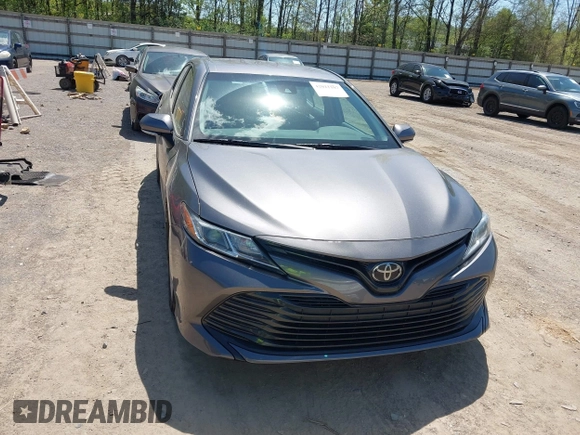 2019 Toyota Camry LE with VIN 4T1B11HK8KU289721, listed as a IAAI auction lot 42021107 with 69,828 mi miles and . Bid and sale history available at DreamBid. Image 12.