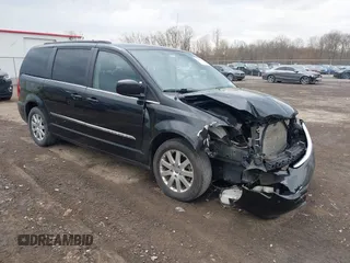 2014 Chrysler Town & Country Touring with VIN 2C4RC1BG7ER449297, listed as a IAAI auction lot 42113170 with 195,878 mi miles and . Bid and sale history available at DreamBid. Image 1.