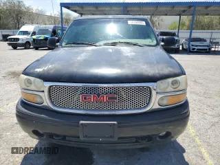 2002 GMC Yukon Denali z VIN 1GKEK63U62J241161, wystawiony jako Copart lot #58350085 z przebiegiem Nie podano mil oraz Szkoda całkowita • Salvage title. Historia ofert i sprzedaży dostępna na DreamBid. Obrazek 5.