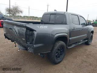 2023 Toyota Tacoma 4WD SR with VIN 3TYCZ5AN5PT157657, listed as a IAAI auction lot 41412536 with 12,828 mi miles. Bid and sale history available at carsss.com. Image 4.