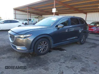 2018 Mazda CX-9 Sport z VIN JM3TCABY8J0203093, wystawiony jako IAAI lot #41218241 z przebiegiem 130 832 mil mil oraz . Historia ofert i sprzedaży dostępna na DreamBid. Obrazek 18.